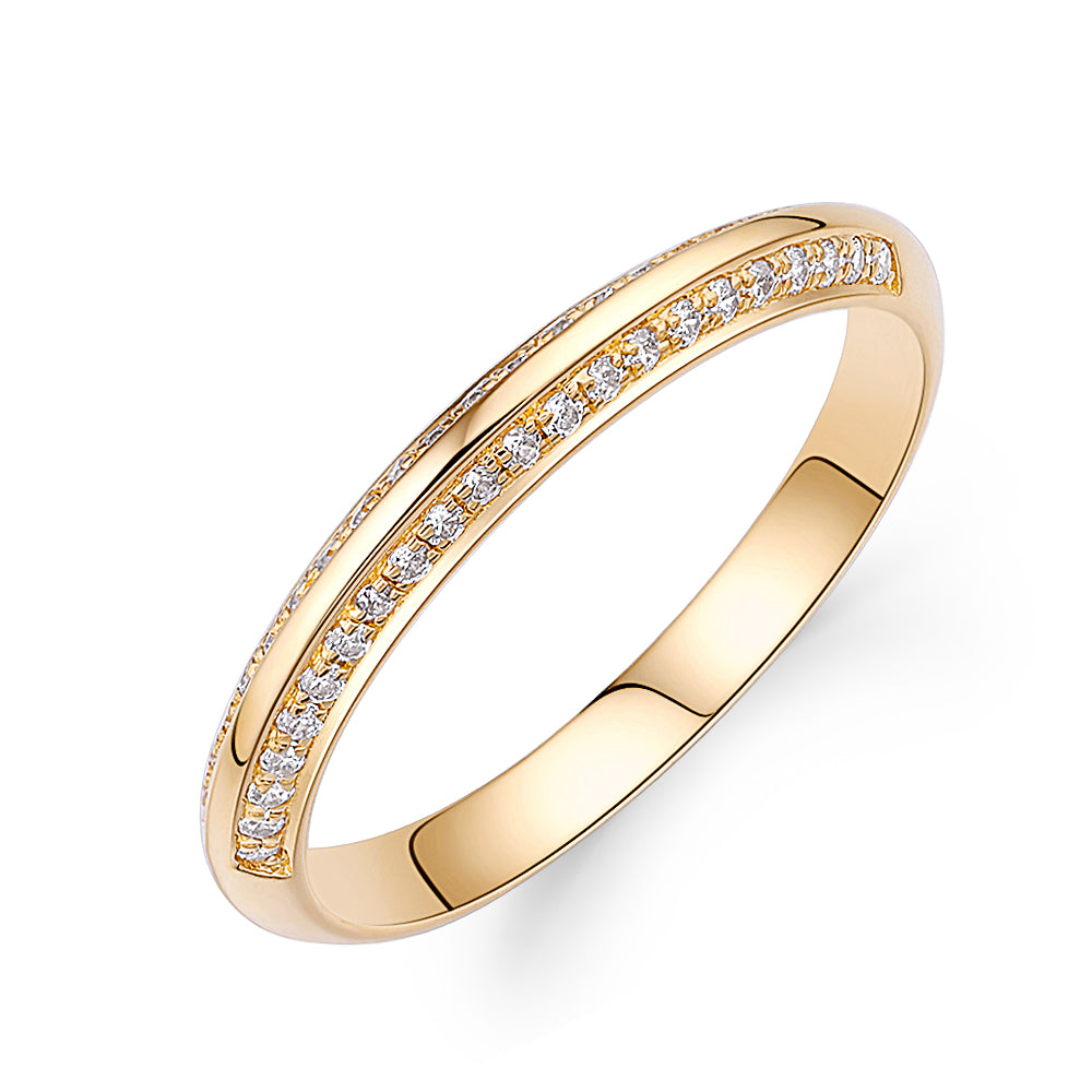 Wedding or eternity band in 14 carat yellow gold