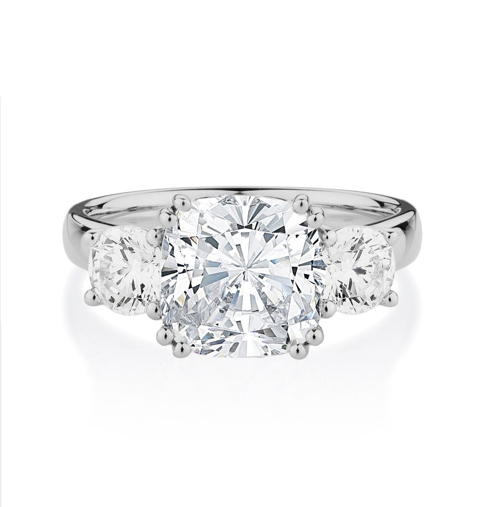 Three stone ring with 3.75 carats* of diamond simulants in 10 carat white gold
