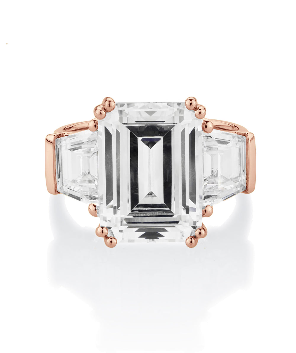 Three stone ring with 11.38 carats* of diamond simulants in 10 carat rose gold