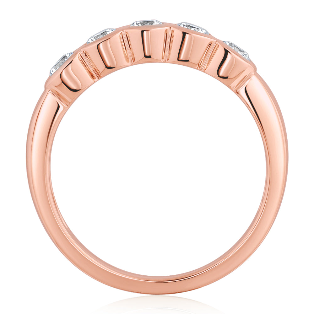 Dress ring with 0.55 carats* of diamond simulants in 10 carat rose gold