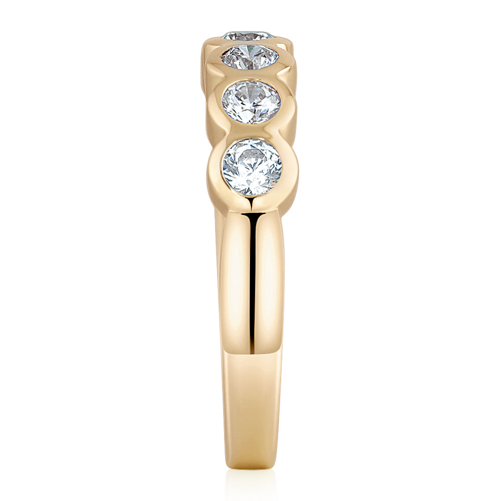Dress ring with 0.55 carats* of diamond simulants in 10 carat yellow gold