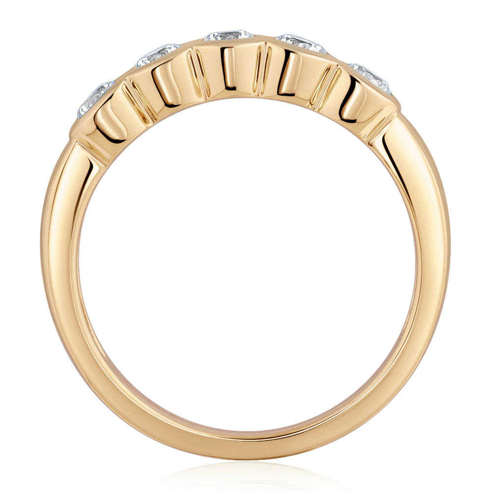 Dress ring with 0.55 carats* of diamond simulants in 10 carat yellow gold