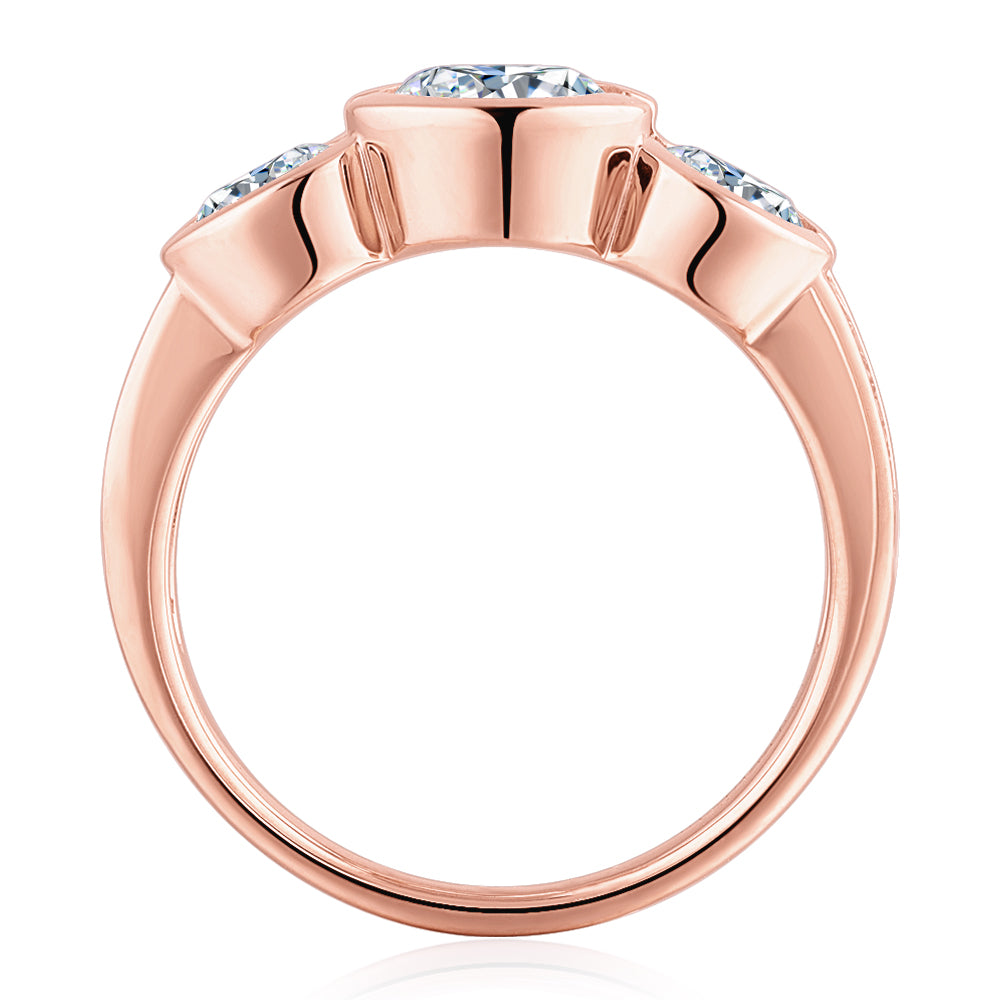 Three stone ring with 2.11 carats* of diamond simulants in 10 carat rose gold