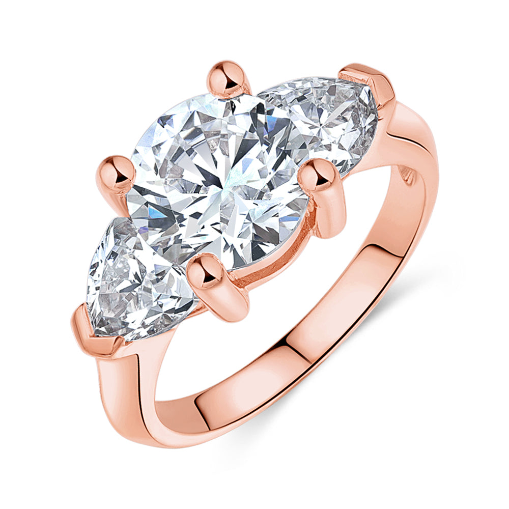 Three stone ring with 4.15 carats* of diamond simulants in 10 carat rose gold