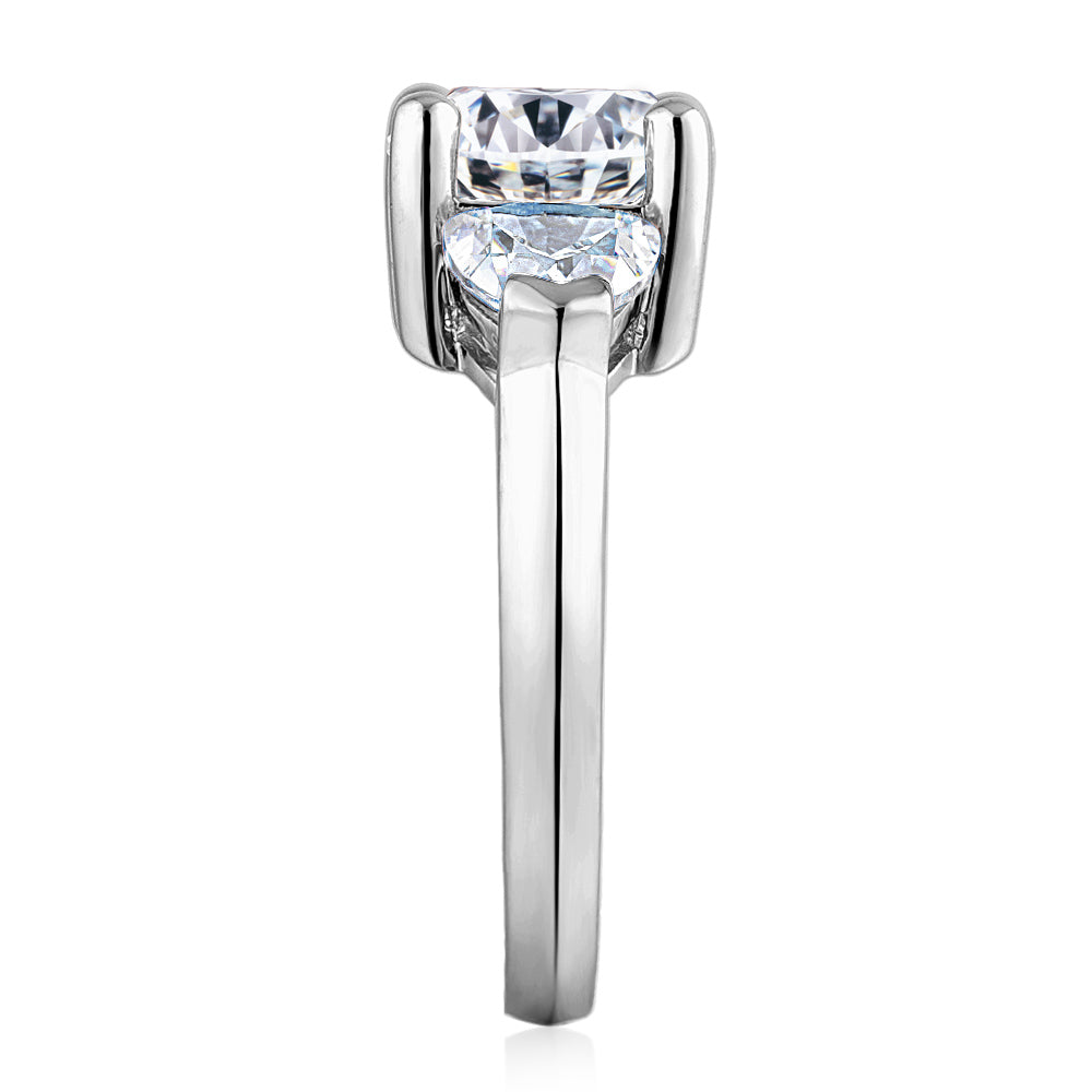 Three stone ring with 4.15 carats* of diamond simulants in 10 carat white gold