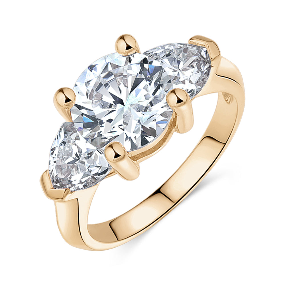 Three stone ring with 4.15 carats* of diamond simulants in 10 carat yellow gold