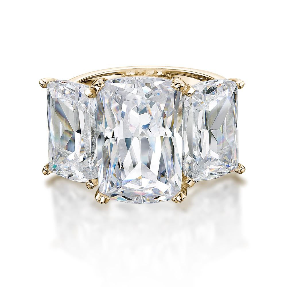 Aurora Three stone ring with 17.17 carats* of diamond simulants in 10 carat yellow gold