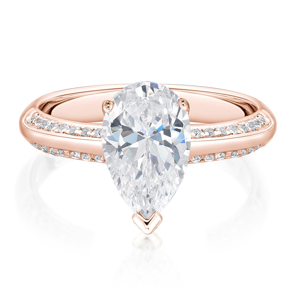 Pear and Round Brilliant shouldered engagement ring with 2 carats* of diamond simulants in 14 carat rose gold