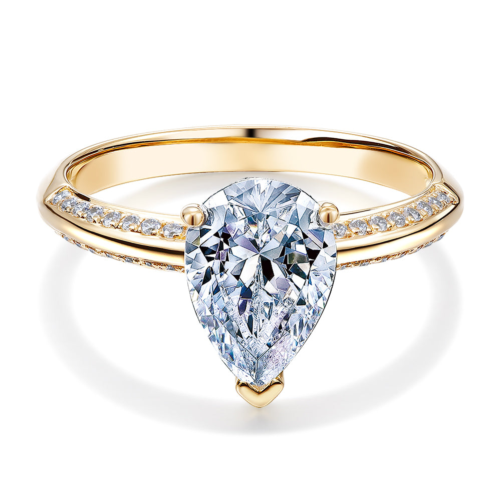 Pear and Round Brilliant shouldered engagement ring with 2 carats* of diamond simulants in 14 carat yellow gold