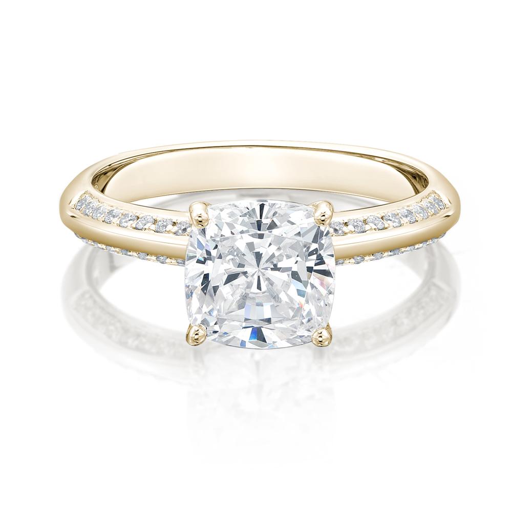 Cushion and Round Brilliant shouldered engagement ring with 1.87 carats* of diamond simulants in 14 carat yellow gold