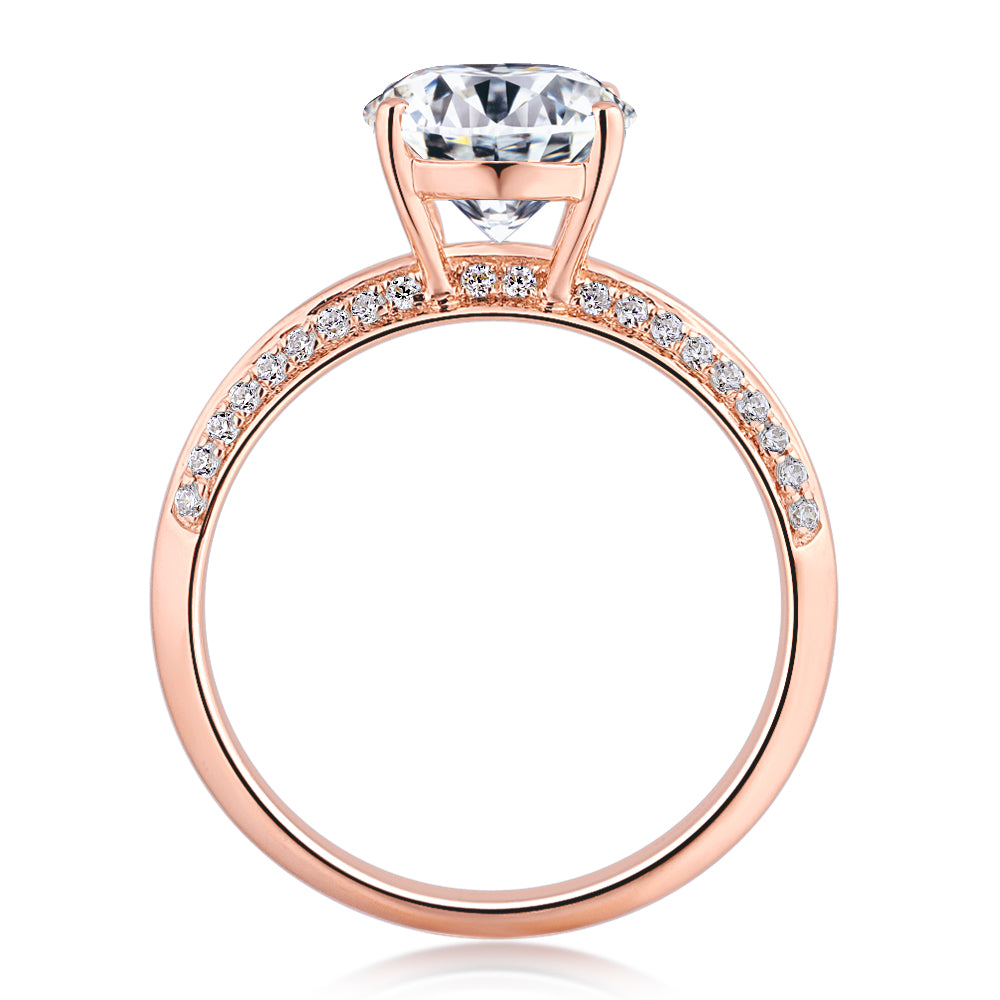 Oval and Round Brilliant shouldered engagement ring with 2.74 carats* of diamond simulants in 14 carat rose gold