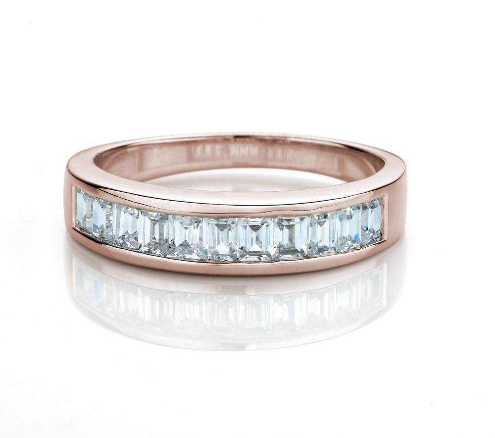 Wedding or eternity band with 0.66 carats* of diamond simulants in 14 carat rose gold