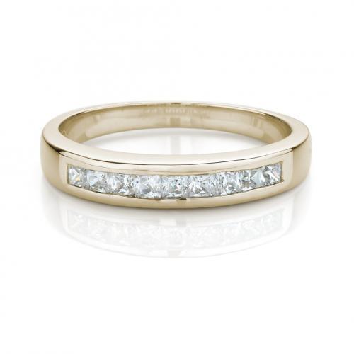 Wedding or eternity band with 0.54 carats* of diamond simulants in 14 carat yellow gold
