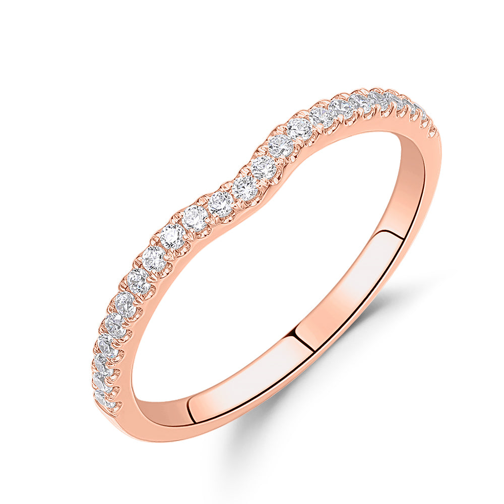 Round Brilliant curved wedding or eternity band in 14 carat rose gold