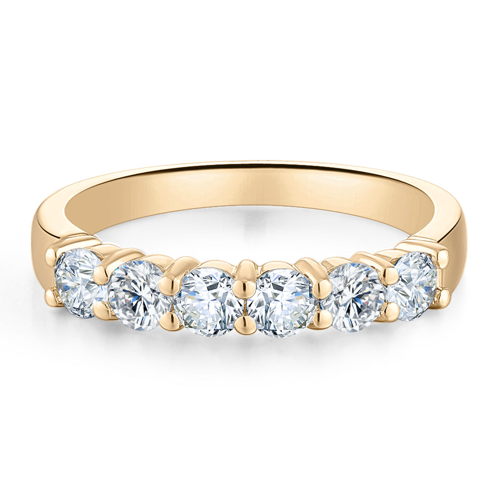 Wedding or eternity band with 0.84 carats* of diamond simulants in 14 carat yellow gold
