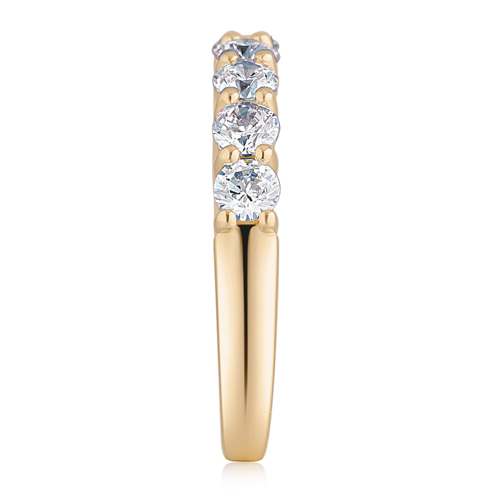 Wedding or eternity band with 0.84 carats* of diamond simulants in 14 carat yellow gold