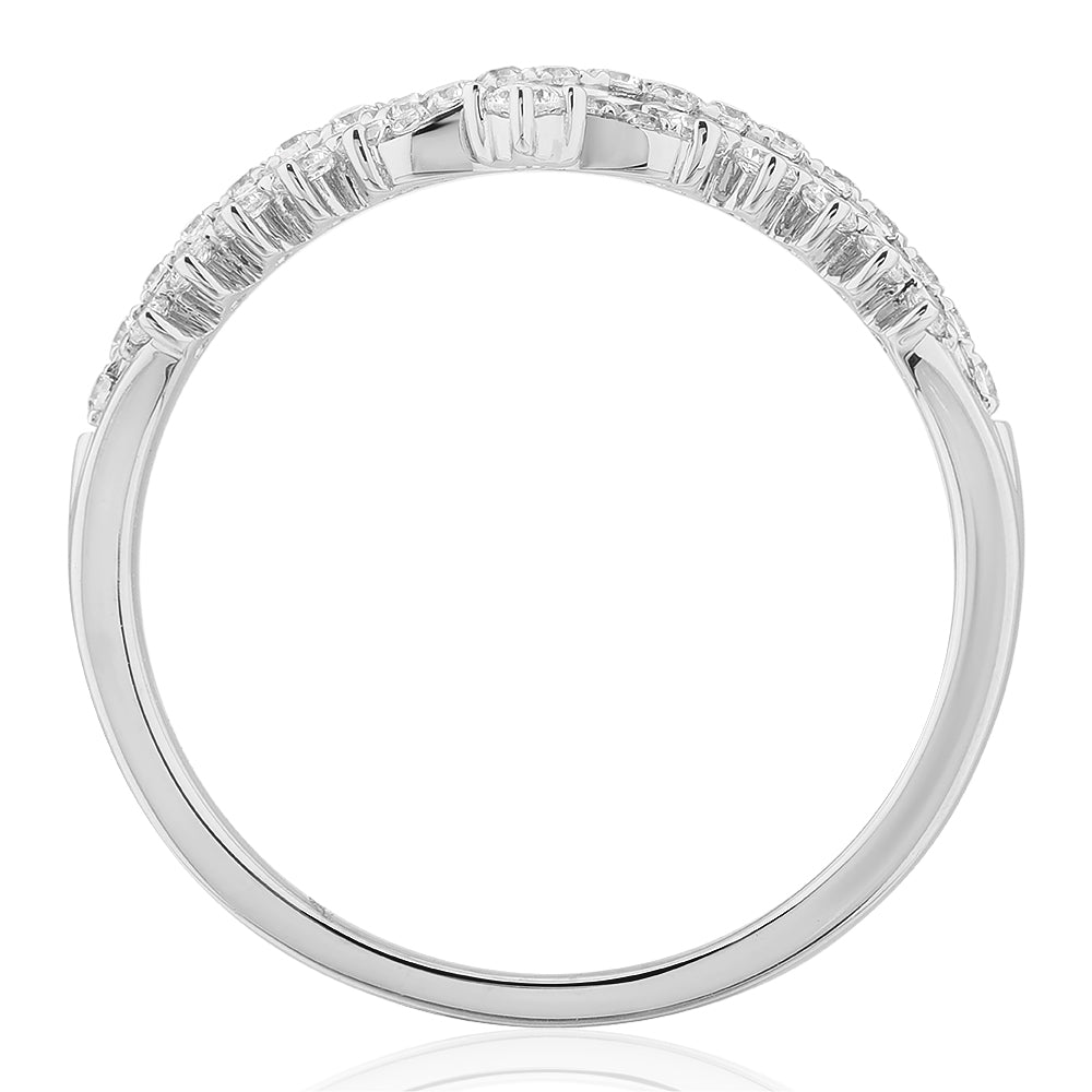 Round Brilliant curved wedding or eternity band with 0.27 carats* of diamond simulants in 10 carat white gold