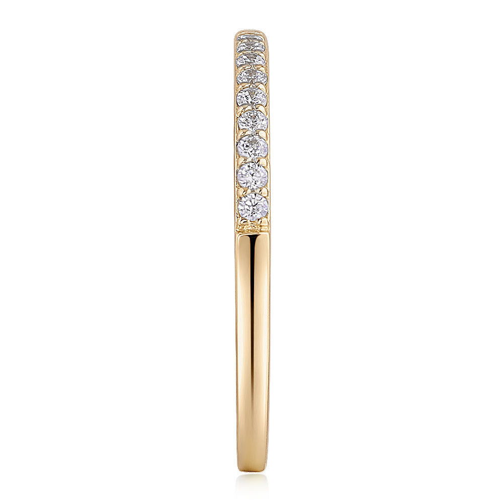 Wedding or eternity band in 14 carat yellow gold