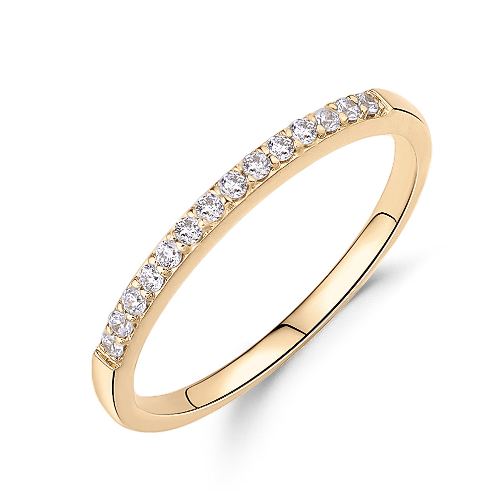 Wedding or eternity band in 14 carat yellow gold