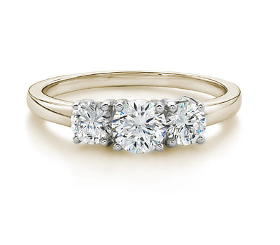 Three stone ring with 1 carats* of diamond simulants in 10 carat yellow and white gold