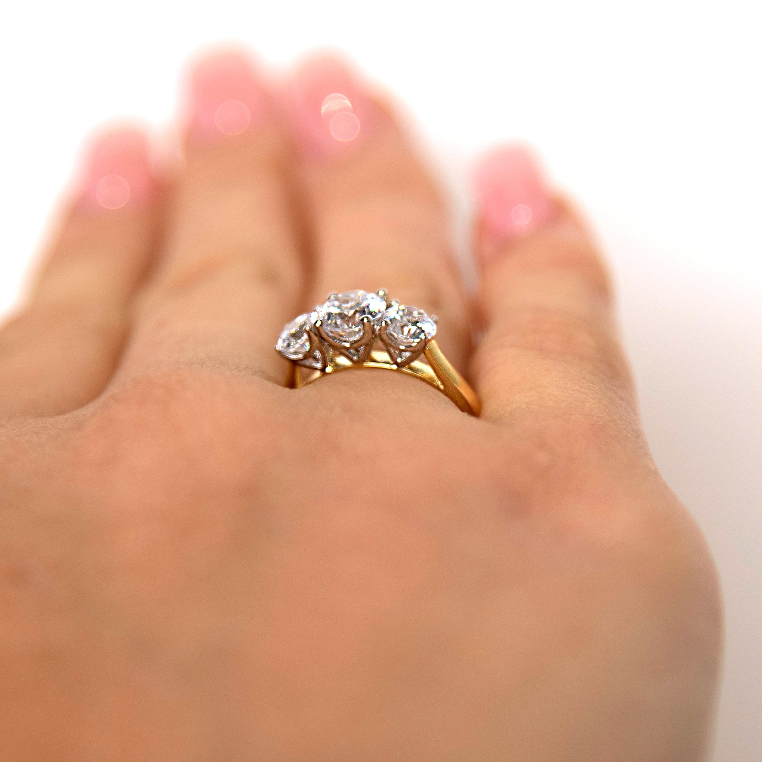 Premium Certified Lab-Grown Diamond 2.00 carat TW round brilliant cut three stone engagement ring in 10 carat yellow and white gold