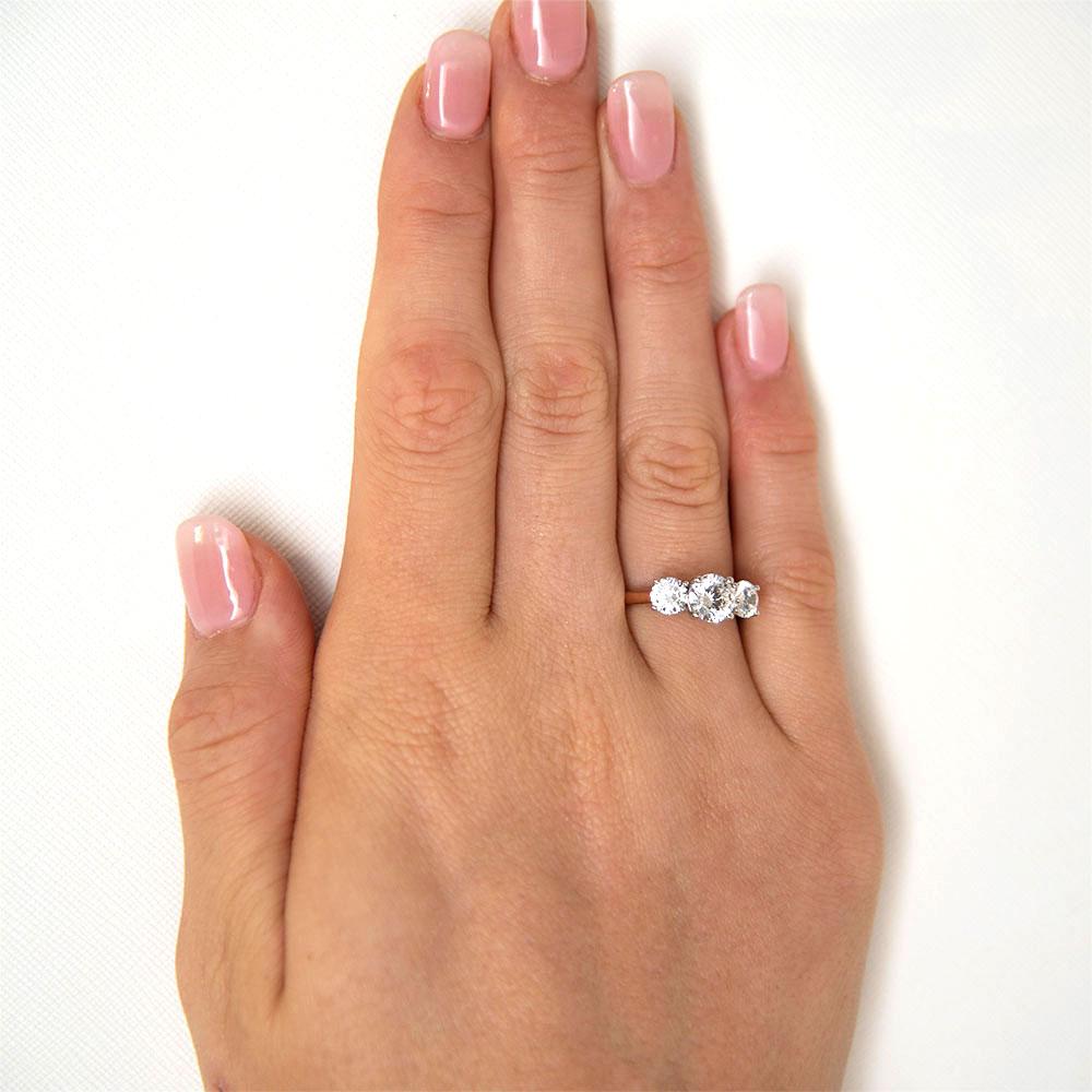 Signature Simulant Diamond 2.00 carat* TW round brilliant cut three stone engagement ring in 10 carat rose and white gold