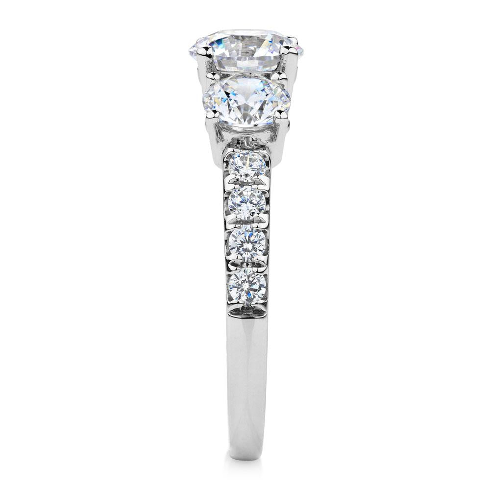 Three stone ring with 2.19 carats* of diamond simulants in 10 carat white gold