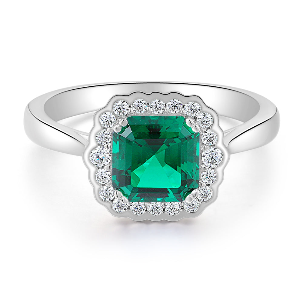 Dress ring with emerald simulant in sterling silver