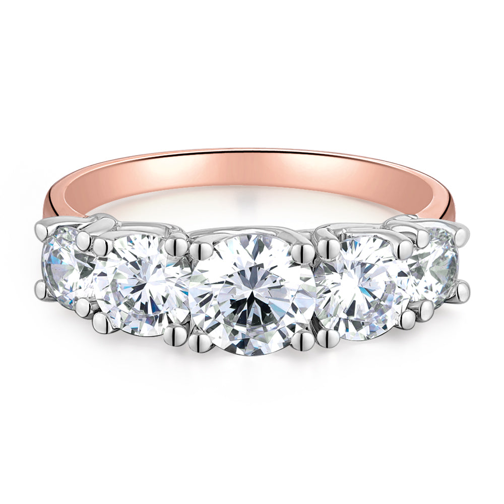 Dress ring with 2.26 carats* of diamond simulants in 10 carat rose and white gold