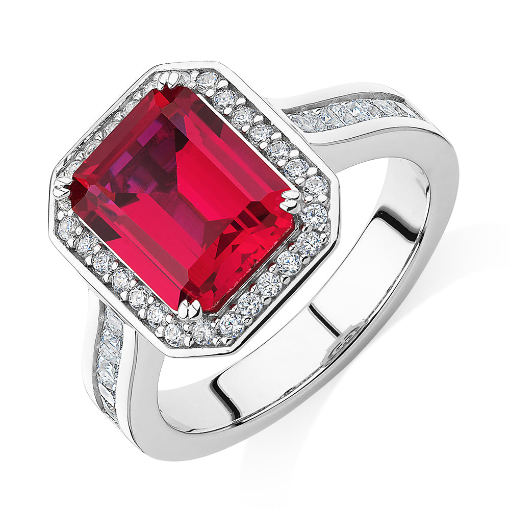 Dress ring with ruby simulant and 0.78 carats* of diamond simulants in sterling silver