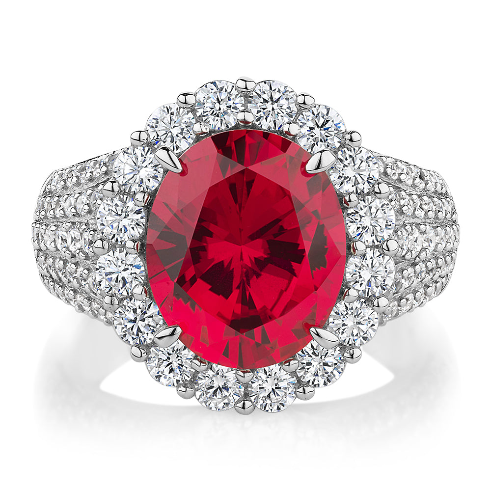 Dress ring with ruby simulant and 1.83 carats* of diamond simulants in sterling silver
