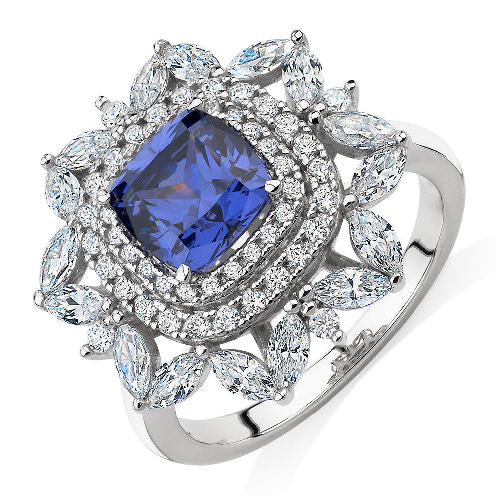 Dress ring with tanzanite simulant and 2.01 carats* of diamond simulants in sterling silver