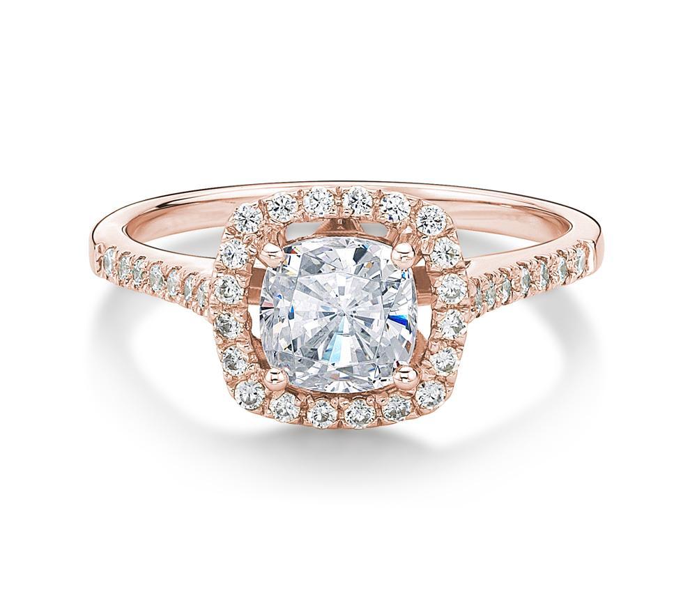 Cushion and Round Brilliant halo engagement ring with 1.08 carats* of diamond simulants in 14 carat rose gold