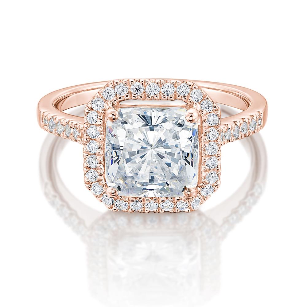 Princess Cut and Round Brilliant halo engagement ring with 3.28 carats* of diamond simulants in 14 carat rose gold