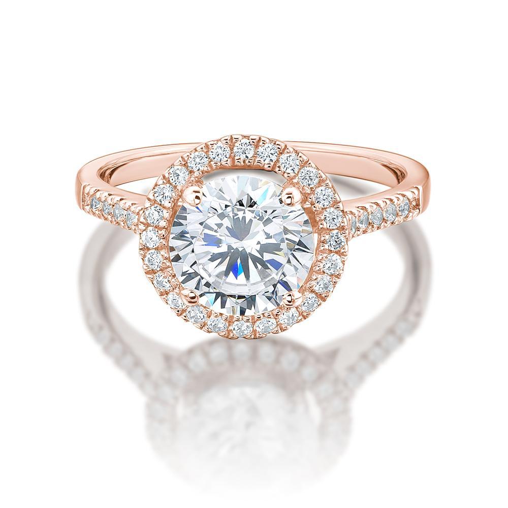 Round Brilliant halo engagement ring with 2.28 carats* of diamond simulants in 14 carat rose gold
