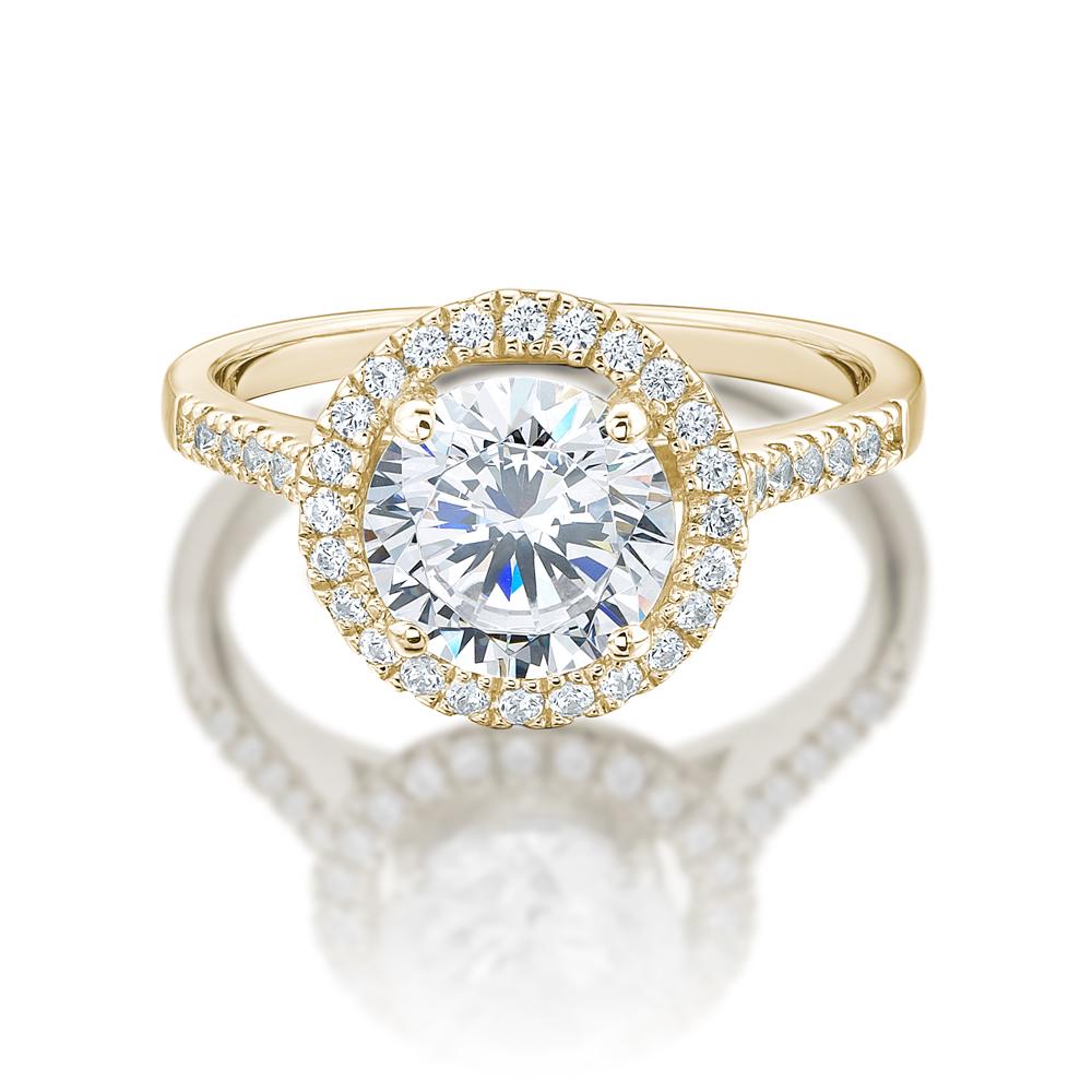 Round Brilliant halo engagement ring with 2.28 carats* of diamond simulants in 14 carat yellow gold
