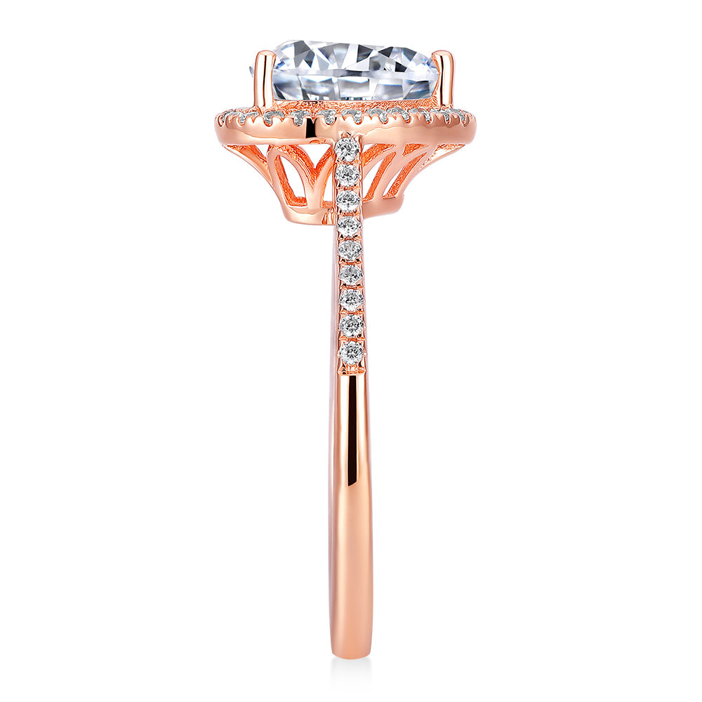 Heart and Round Brilliant halo engagement ring with 1.94 carats* of diamond simulants in 14 carat rose gold