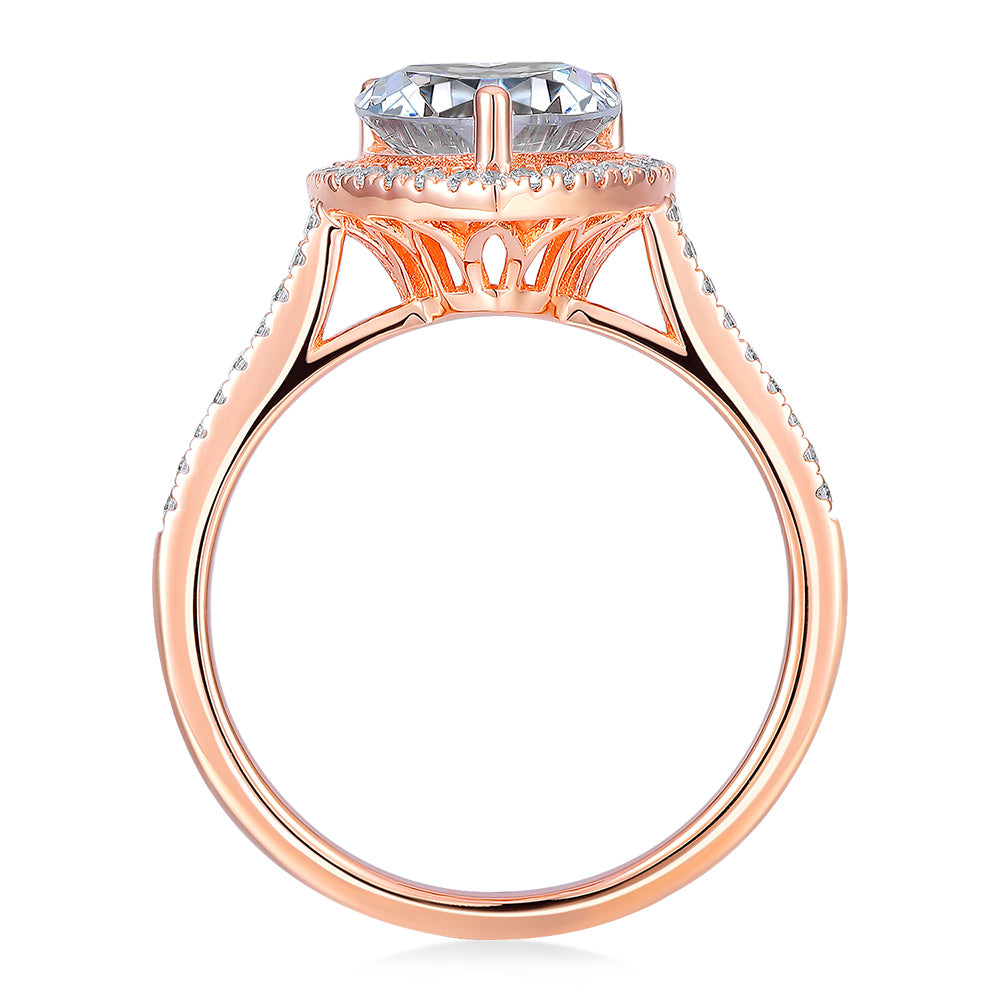 Heart and Round Brilliant halo engagement ring with 1.94 carats* of diamond simulants in 14 carat rose gold