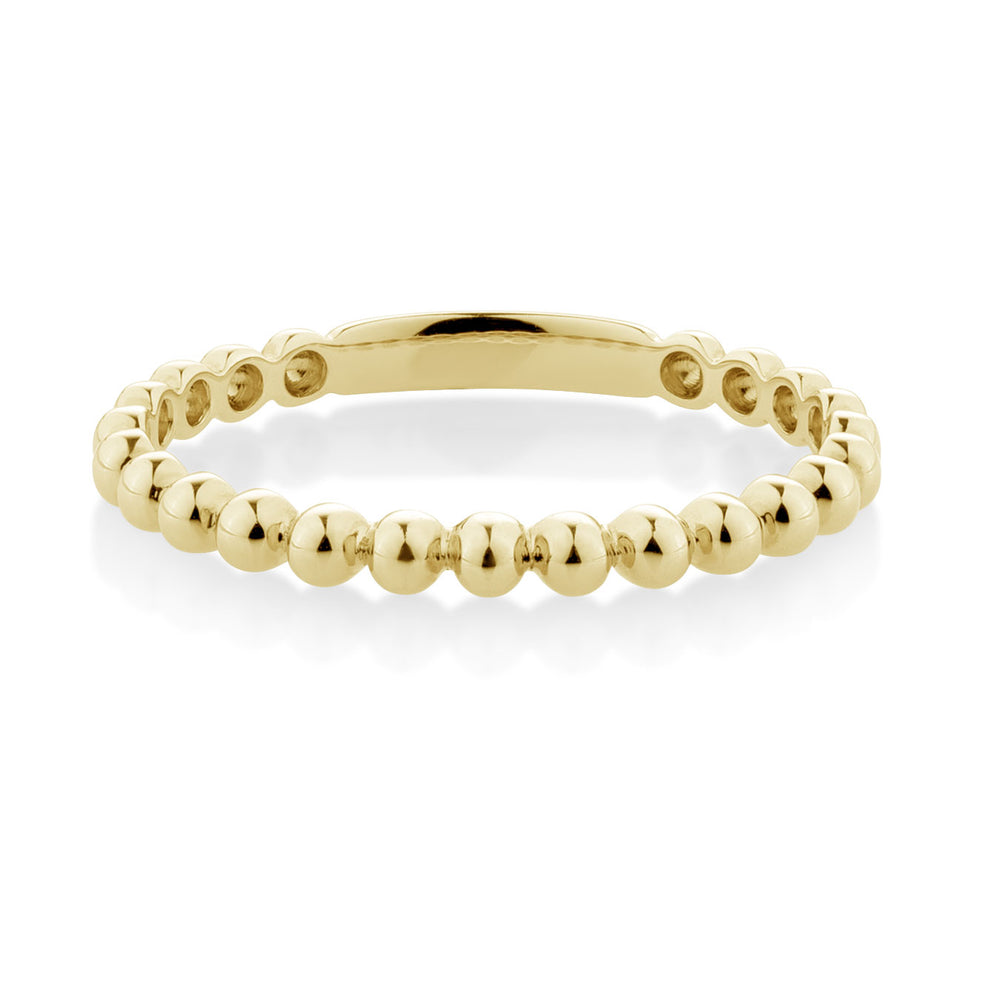 Wedding or eternity band in 10 carat yellow gold