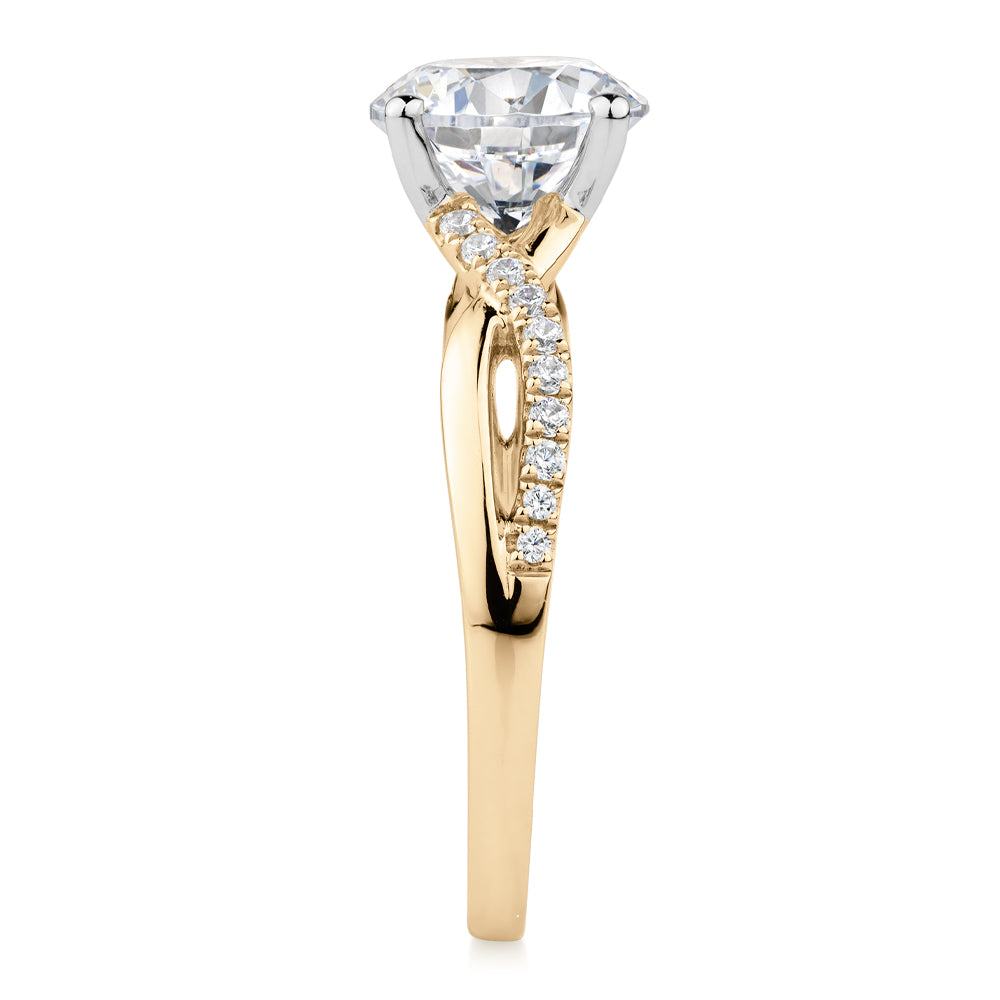Round Brilliant shouldered engagement ring with 2.17 carats* of diamond simulants in 14 carat yellow and white gold