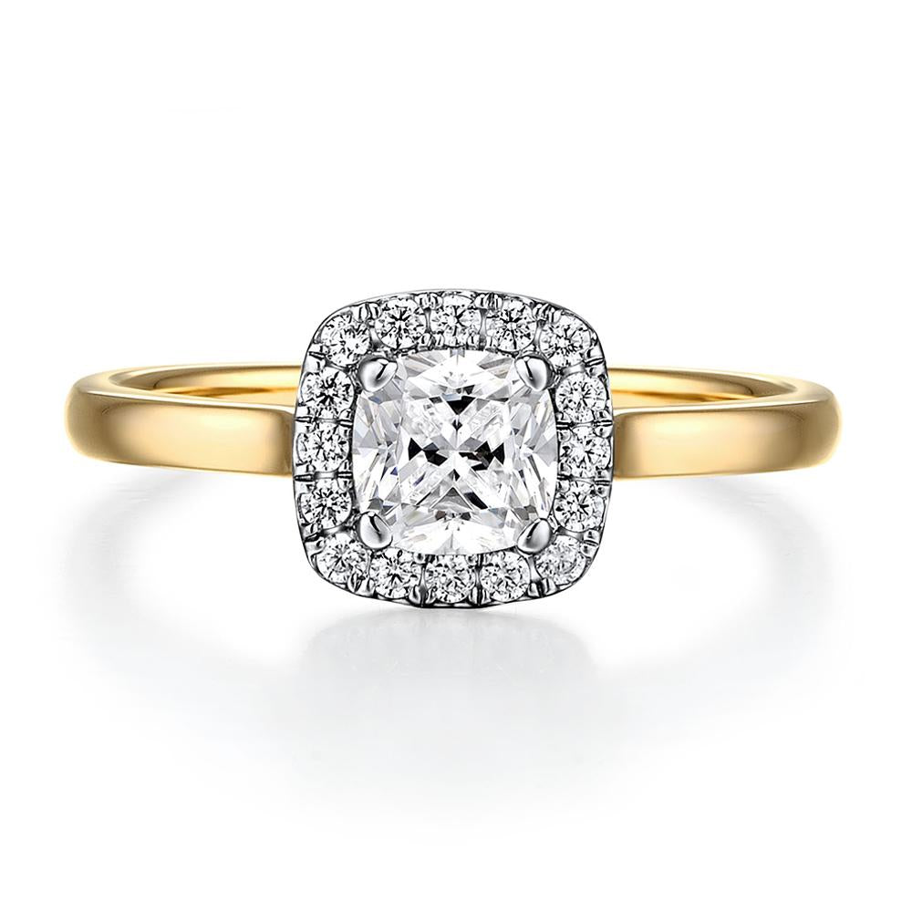 Cushion and Round Brilliant halo engagement ring with 0.9 carats* of diamond simulants in 14 carat yellow and white gold