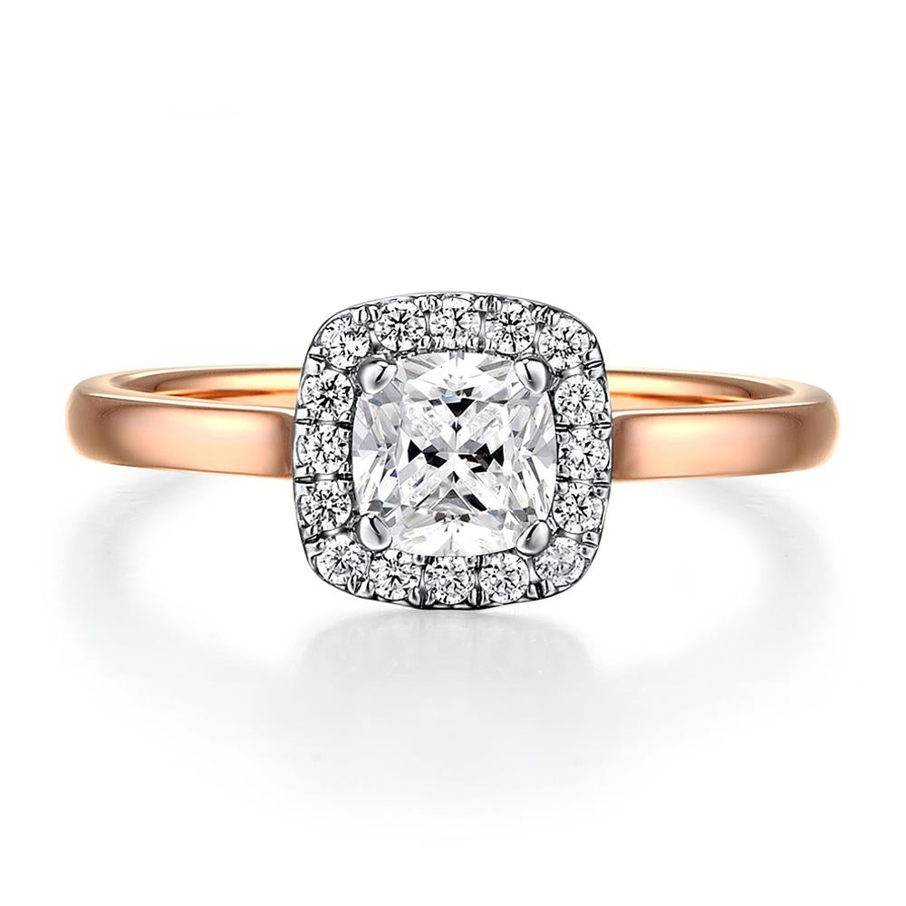 Cushion and Round Brilliant halo engagement ring with 0.9 carats* of diamond simulants in 14 carat rose and white gold