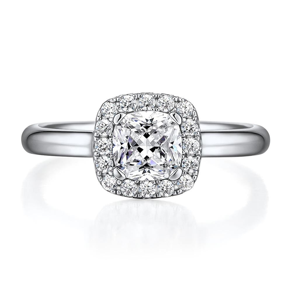 Cushion and Round Brilliant halo engagement ring with 0.9 carats* of diamond simulants in 14 carat white gold