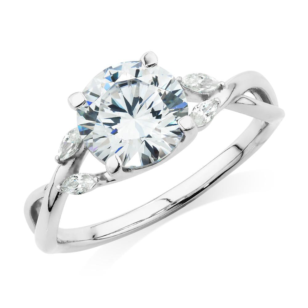 Round Brilliant and Marquise shouldered engagement ring with 2.14 carats* of diamond simulants in 14 carat white gold