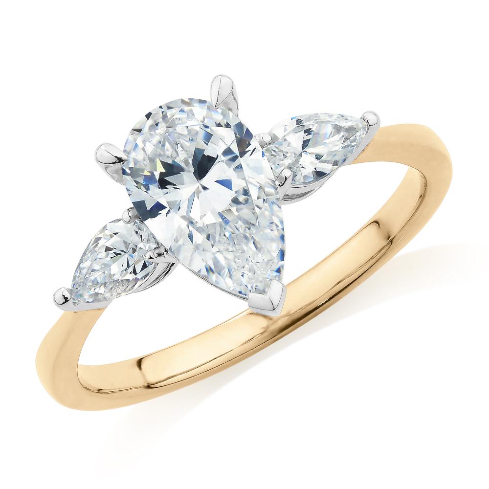 Pear shouldered engagement ring with 2.21 carats* of diamond simulants in 14 carat yellow and white gold