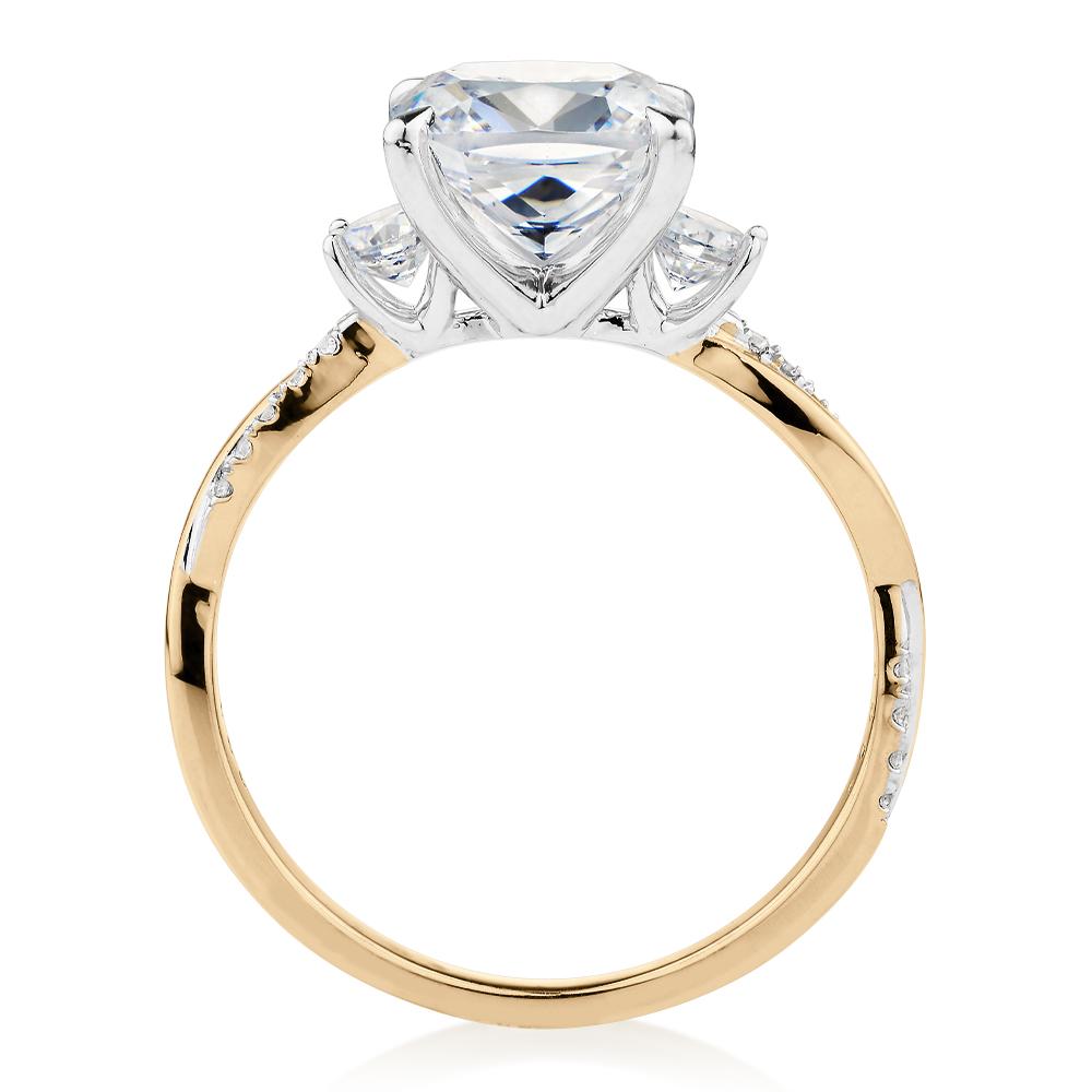 Cushion and Round Brilliant shouldered engagement ring with 2.35 carats* of diamond simulants in 14 carat yellow and white gold