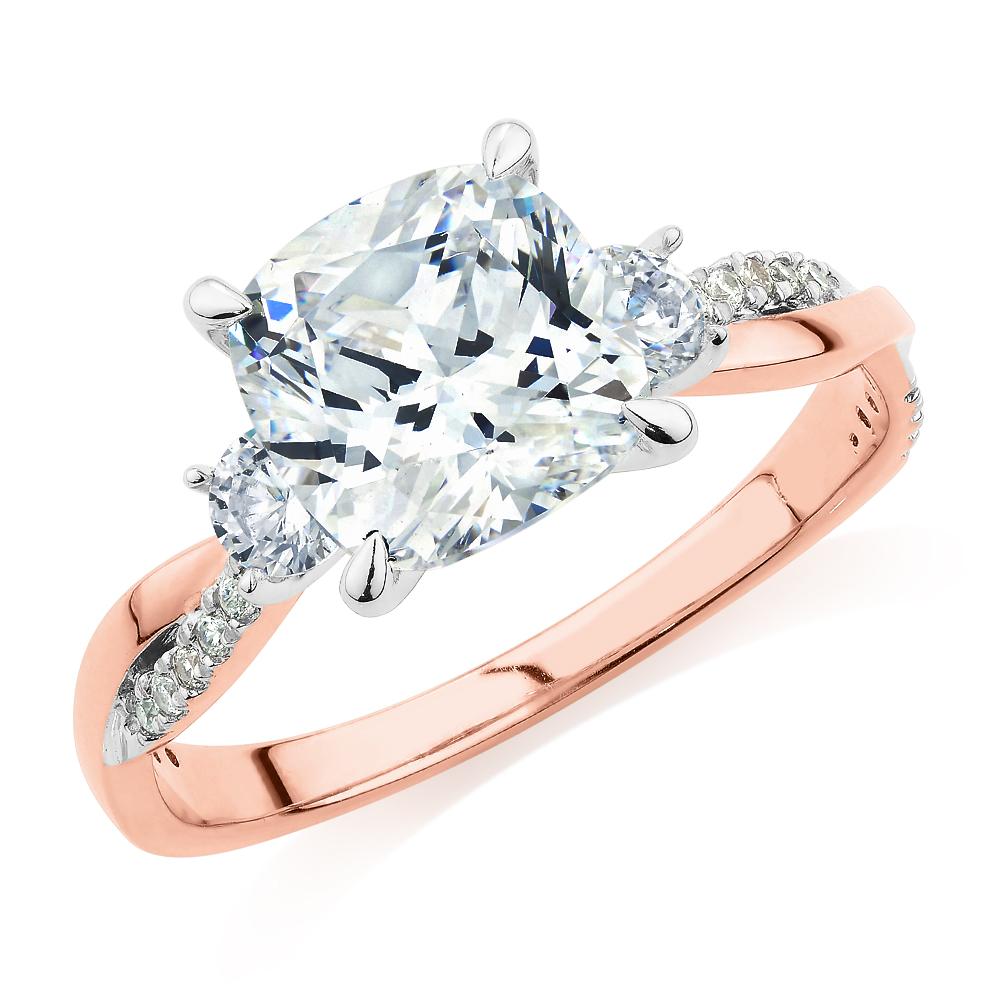 Cushion and Round Brilliant shouldered engagement ring with 2.35 carats* of diamond simulants in 14 carat rose and white gold