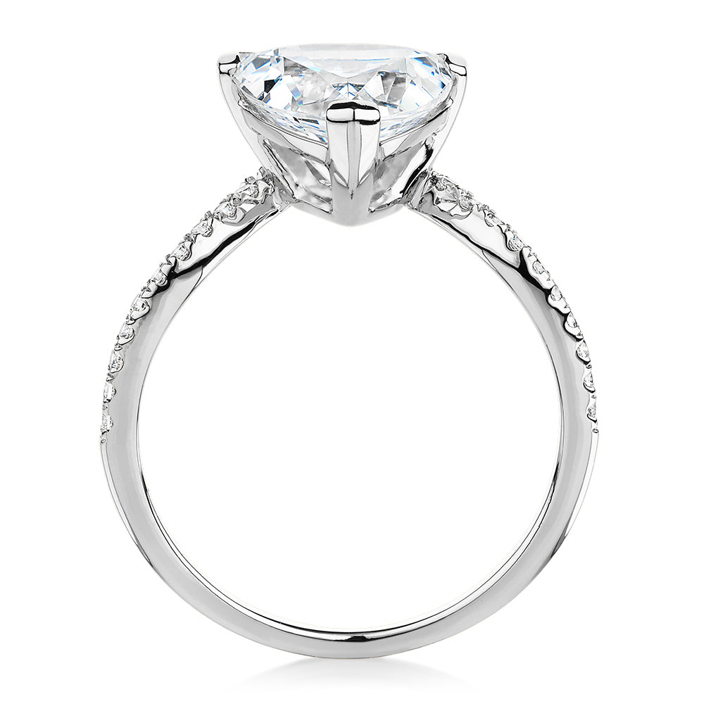 Trilliant and Round Brilliant shouldered engagement ring with 2.52 carats* of diamond simulants in 14 carat white gold