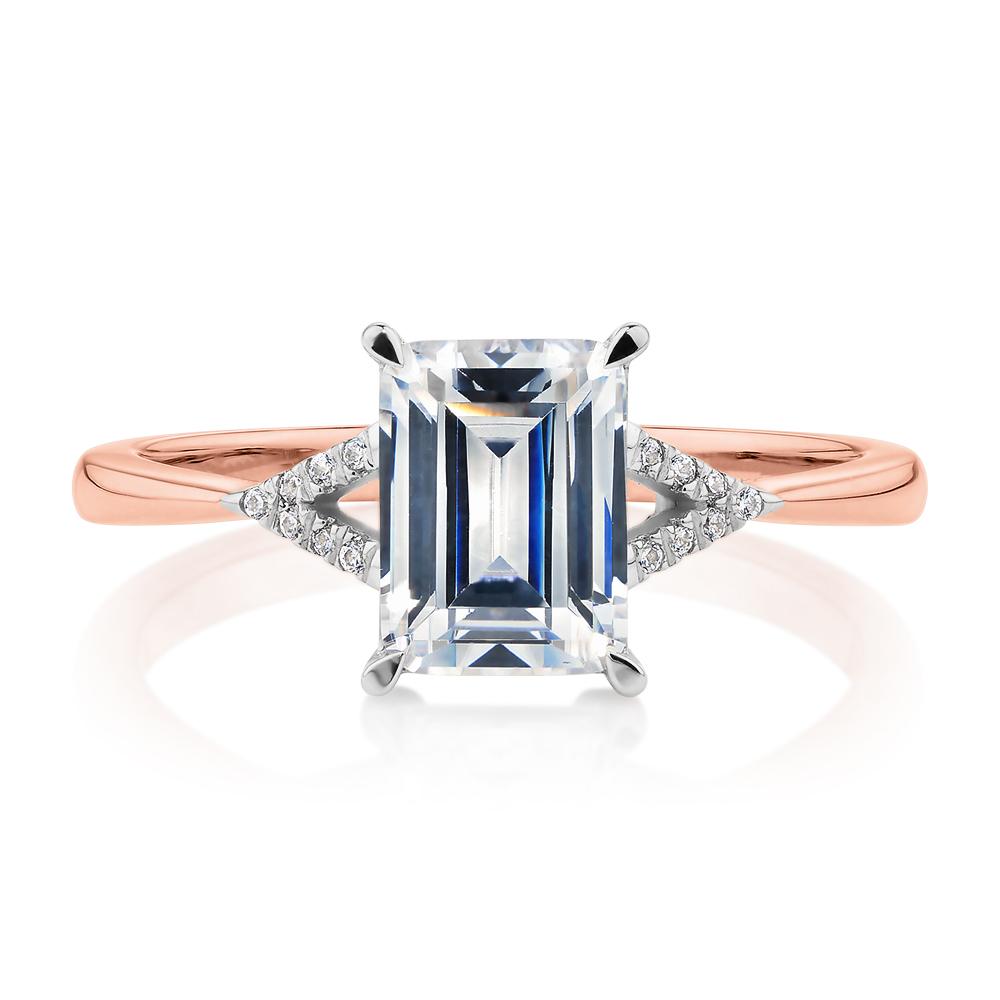 Emerald Cut and Round Brilliant shouldered engagement ring with 1.78 carats* of diamond simulants in 14 carat rose and white gold