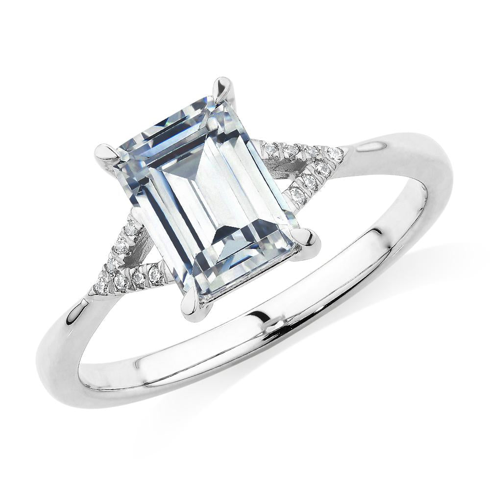 Emerald Cut and Round Brilliant shouldered engagement ring with 1.78 carats* of diamond simulants in 14 carat white gold